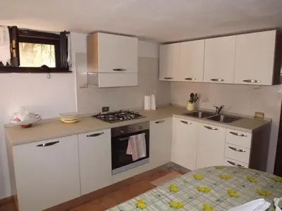 Cucina o angolo cottura di Relax a Calasapone