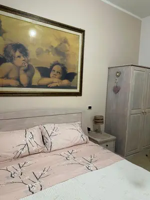 Letto o letti in una camera di Su Coccu
