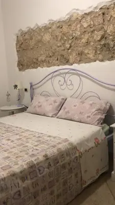 Letto o letti in una camera di Su Coccu