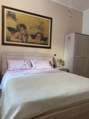 Letto o letti in una camera di Su Coccu