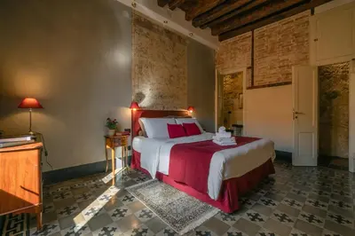 Letto o letti in una camera di Cappuccine GuestHouse
