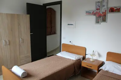 Letto o letti in una camera di Affittacamere la Medusa