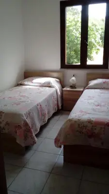 Letto o letti in una camera di Bithia Apartment