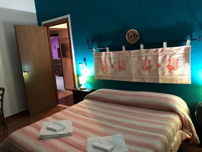 Letto o letti in una camera di B&B Daddanca