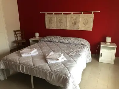 Letto o letti in una camera di B&B Daddanca