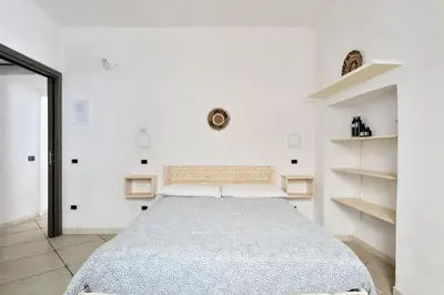 Letto o letti in una camera di Al Vicoletto - Genuine Hospitality & Private Parking