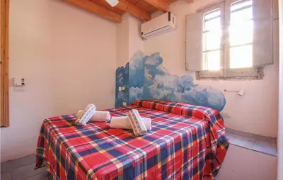Letto o letti in una camera di Tunnaria