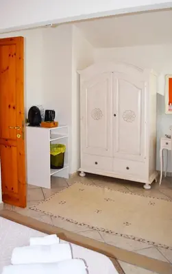 Letto o letti in una camera di Casa Vacanza Porto Frailis già Porto Frailis B&B