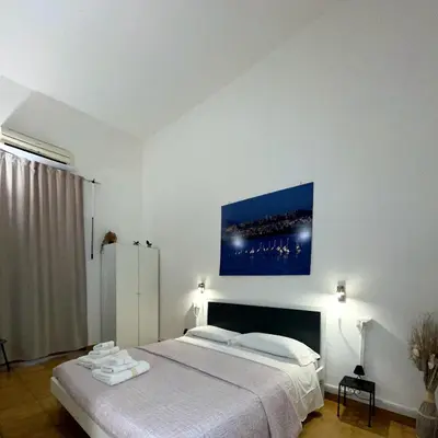 Letto o letti in una camera di Affittacamere Guesthouse Maristella