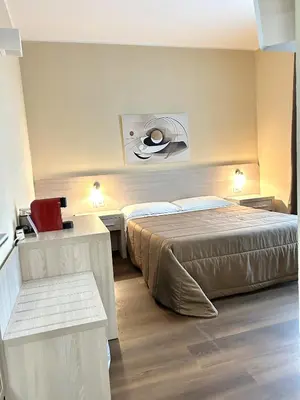 Letto o letti in una camera di Affittacamere In Centro