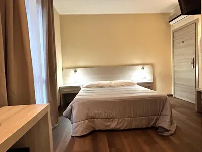 Letto o letti in una camera di Affittacamere In Centro