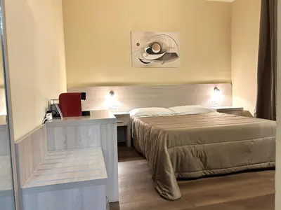 Letto o letti in una camera di Affittacamere In Centro