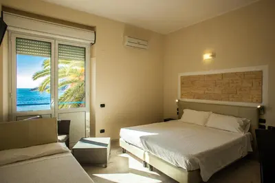 Letto o letti in una camera di Hotel Calamosca