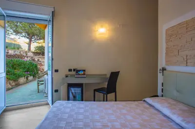 Letto o letti in una camera di Hotel Calamosca