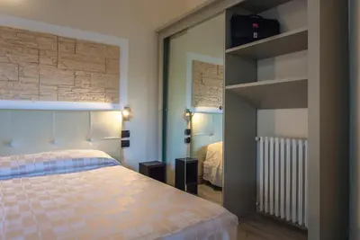Letto o letti in una camera di Hotel Calamosca