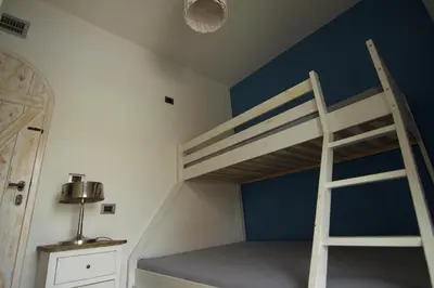 Letto o letti in una camera di La Pazienza