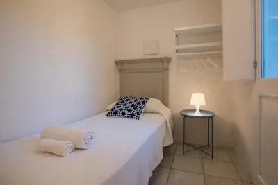 Letto o letti in una camera di Sul Mare Sardegna Villa Eulimene