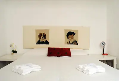 Letto o letti in una camera di IzzHome Baylle