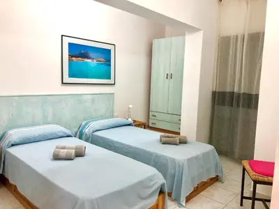 Letto o letti in una camera di Case Vacanza Mare Nostrum