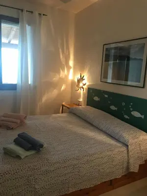 Letto o letti in una camera di Case Vacanza Mare Nostrum