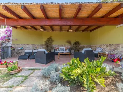 Area soggiorno di Ollastu Apartments Villasimius