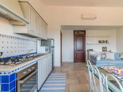 Cucina o angolo cottura di Ollastu Apartments Villasimius