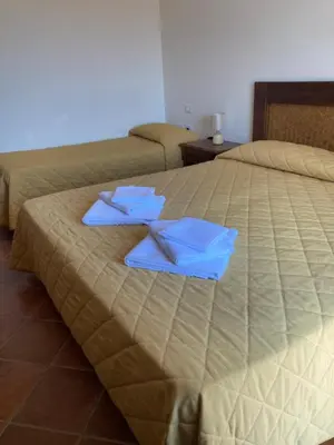 Letto o letti in una camera di Hotel Funtana Ena