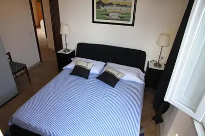 Letto o letti in una camera di Los Flamingos