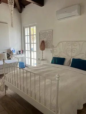 Letto o letti in una camera di La Casa di Nina