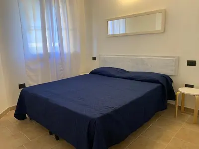 Letto o letti in una camera di Le Palmette