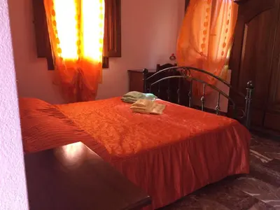 Letto o letti in una camera di Sa Perda Lada
