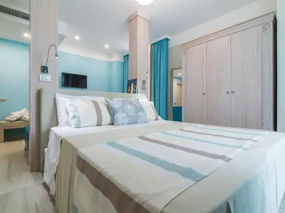 Letto o letti in una camera di L'Ambasciata Hotel de Charme