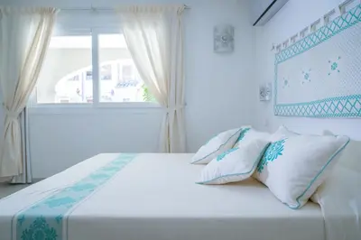 Letto o letti in una camera di Hotel Regina Simius