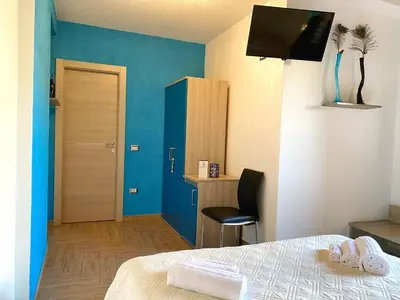 Letto o letti in una camera di Gioia Guesthouse
