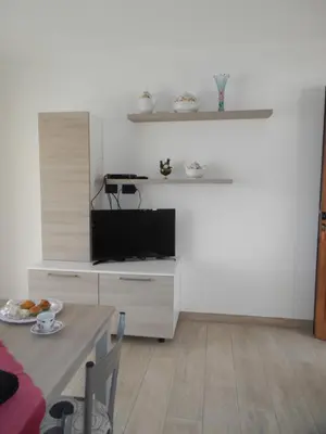 TV o dispositivi per l'intrattenimento presso La Costa Est Villa con Vista Mare in Ogliastra Sardegna
