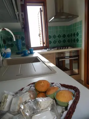 Cucina o angolo cottura di La Costa Est Villa con Vista Mare in Ogliastra Sardegna