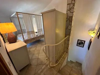 Letto o letti in una camera di Villetta Calasetta intera casa vacanze