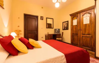 Letto o letti in una camera di Su Connotu