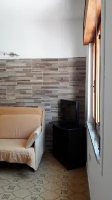 TV o dispositivi per l'intrattenimento presso The Marchisio Apartment