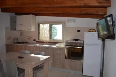 Cucina o angolo cottura di Terrazza sul golfo degli angeli