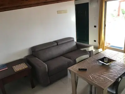 Area soggiorno di Terrazza sul golfo degli angeli