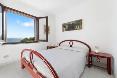 Letto o letti in una camera di Carloforte Palme House