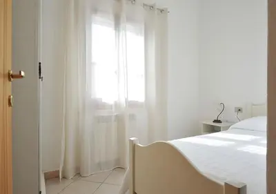 Letto o letti in una camera di Sa Iba Resort