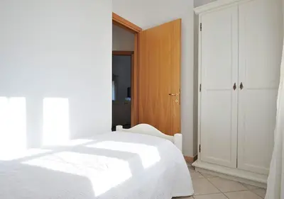 Letto o letti in una camera di Sa Iba Resort