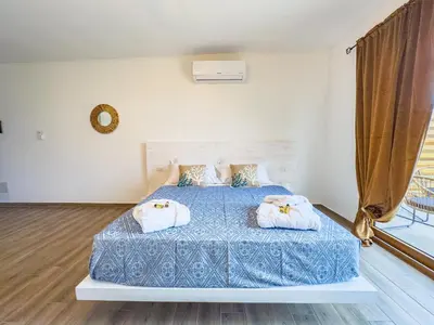 Letto o letti in una camera di Sa Iba Resort