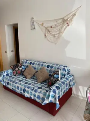 Area soggiorno di Appartamento nel cuore di Villasimius