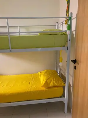 Letto o letti in una camera di Appartamento nel cuore di Villasimius