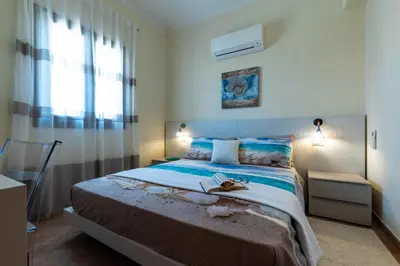 Letto o letti in una camera di La Casa delle Conchiglie