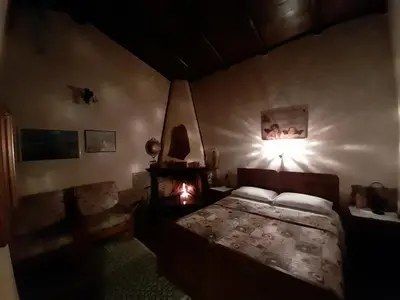 Letto o letti in una camera di Chalet Su Foxile