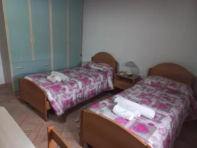 Letto o letti in una camera di Il Nido dell'aquila
